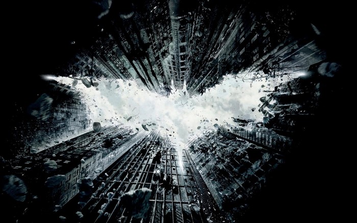 Batman logo formed by collapsing skyscrapers