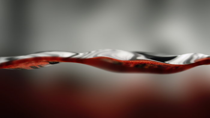 Abstract red and silver liquid surface