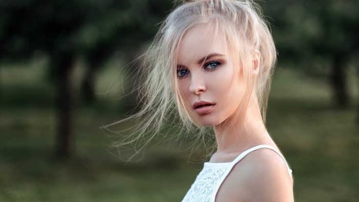 Portrait of a Blonde Woman Outdoors in Wind