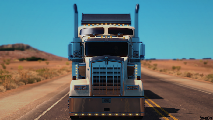 Kenworth W900 Truck driving on a desert highway