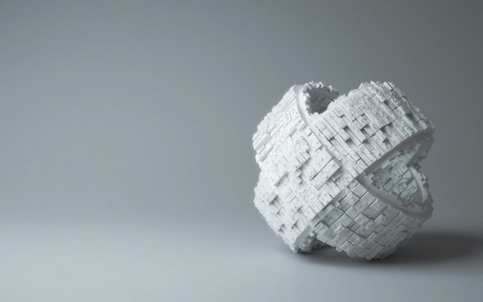White 3D object with intricate geometric patterns