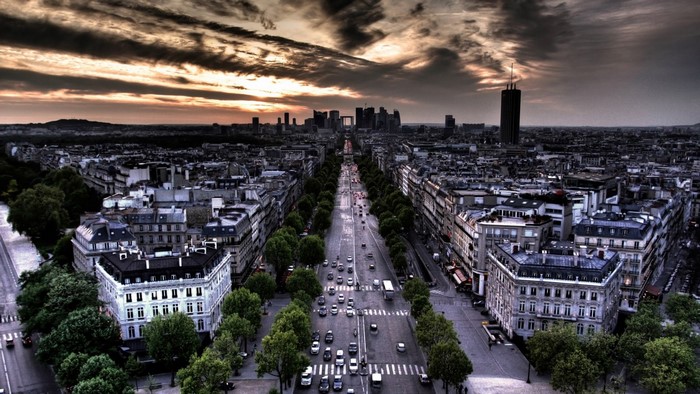 Aerial view of Paris Champs-Élysées with modern skyscrapers in distance