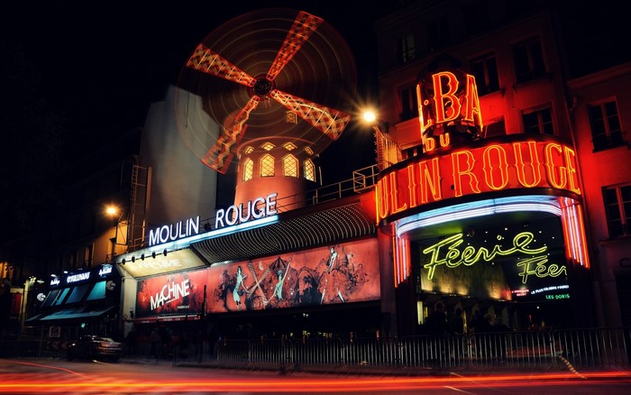 Moulin Rouge at night with neon signs
