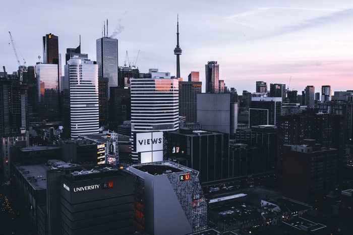 Toronto cityscape at dusk with CN Tower