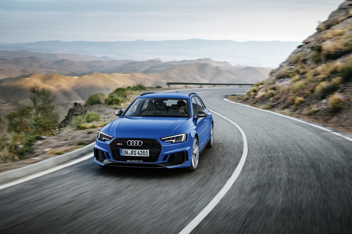 Audi RS4 Avant driving on a mountain road