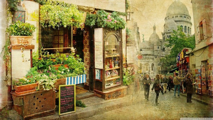 Parisian street with Sacre-Coeur Basilica and flower shop