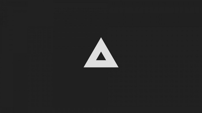White triangle logo on black background