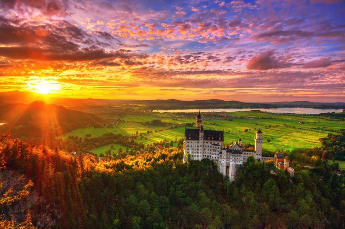 Neuschwanstein Castle at Sunset with Dramatic Clouds