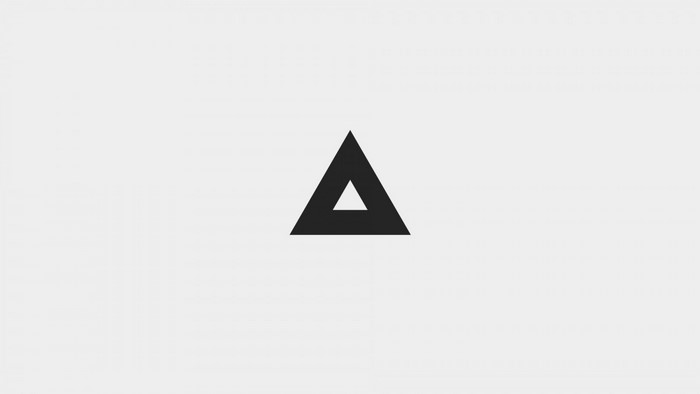 Black triangle with a white triangle cutout