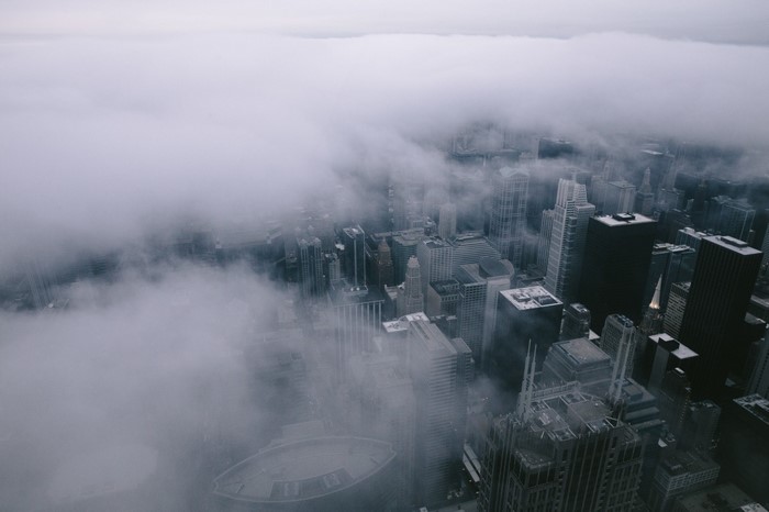 Chicago cityscape shrouded in fog from above