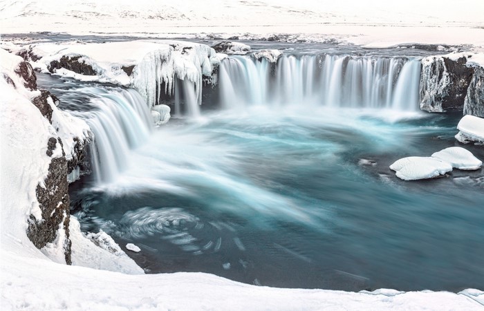 Winter waterfall with ice formations