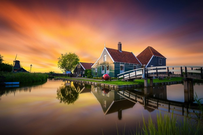 Dutch Village with Windmill at Sunset