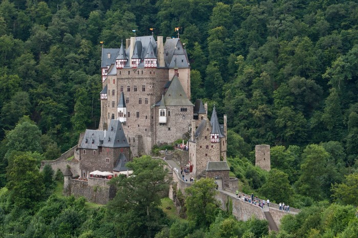 Eltz Castle surrounded by a dense forest