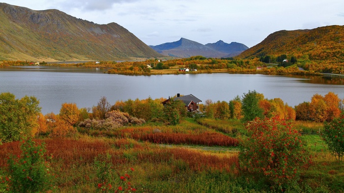 Autumn landscape with lake and mountains