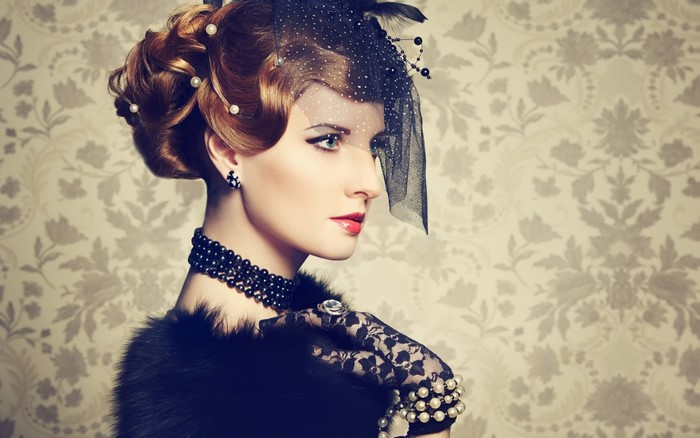 Elegant Vintage Portrait of Woman with Veil and Pearls
