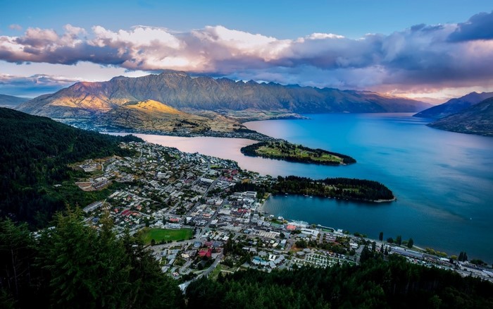 Aerial view of Queenstown, New Zealand with mountains and lake