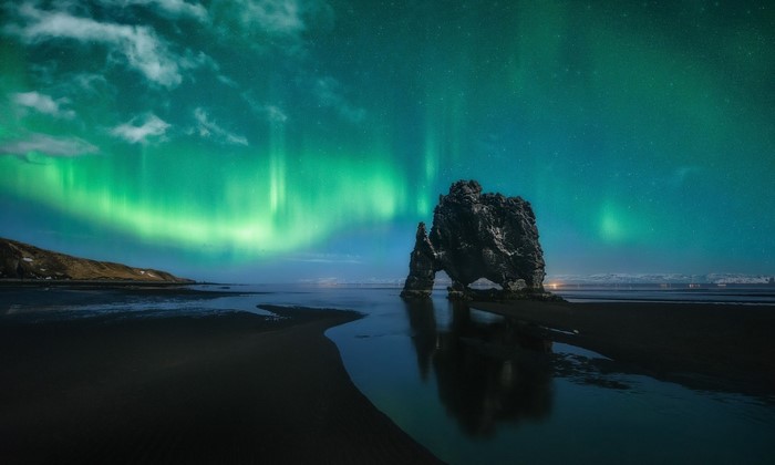 Hvitserkur rock formation under Aurora Borealis in Iceland