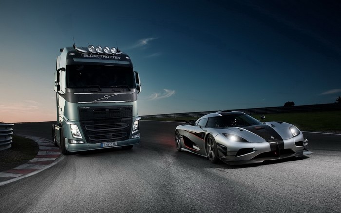 Volvo Truck and Koenigsegg Agera on a Race Track