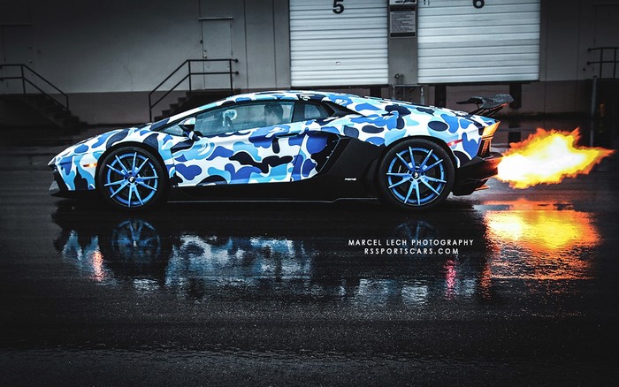 Lamborghini Aventador with blue camouflage wrap and flames