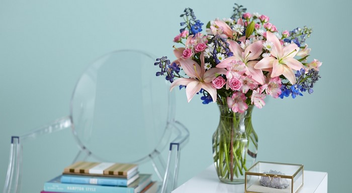 Pink and blue flower bouquet in a vase