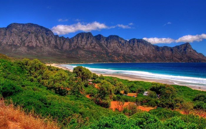 Mountain range overlooking a beach and ocean