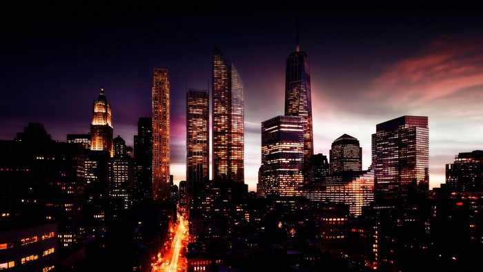 New York City skyline at dusk with illuminated skyscrapers