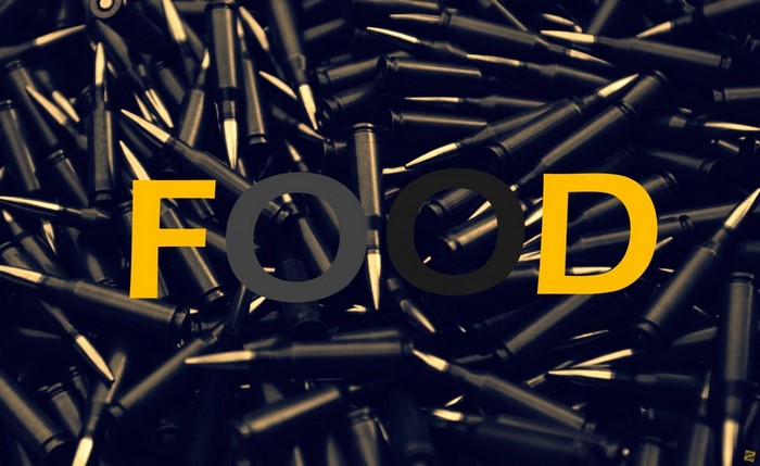 Text "FOOD" over pile of ammunition