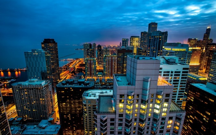 Chicago cityscape at dusk with lake and skyscrapers
