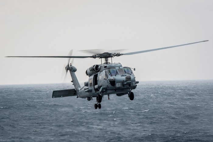 Sikorsky MH-60R Seahawk helicopter over the ocean