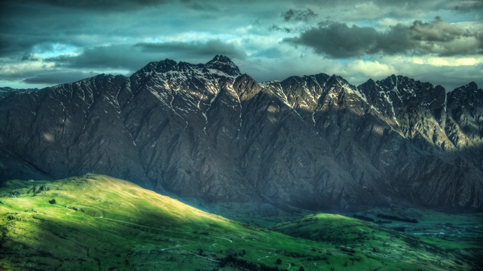 Mountain range in New Zealand with green hills