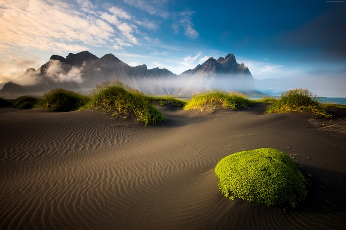Black sand dunes and mountains in Iceland