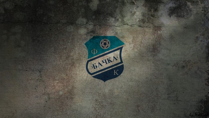 FK Bačka logo on a textured wall