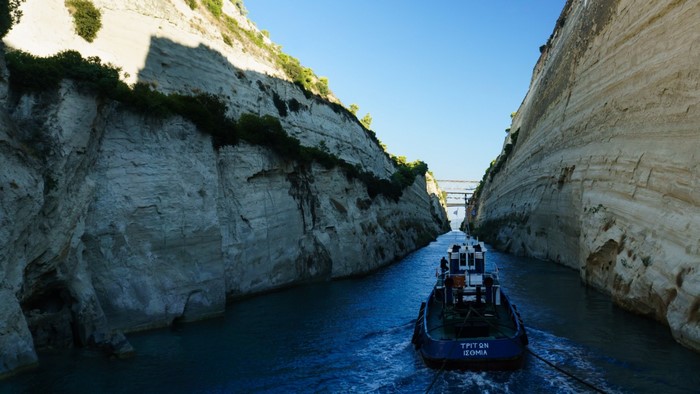Tugboat sailing through Corinth Canal, Greece