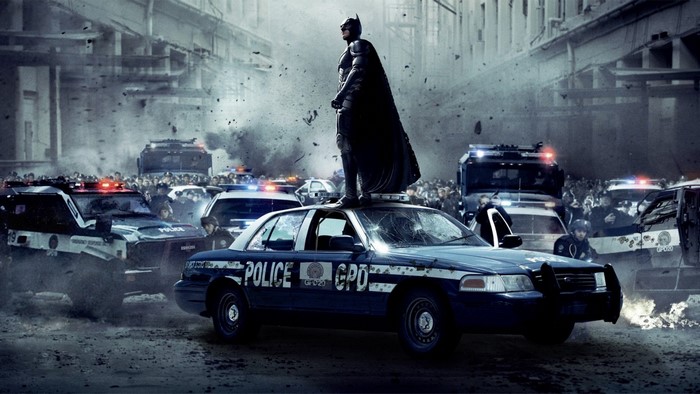 Batman from The Dark Knight Rises on police car