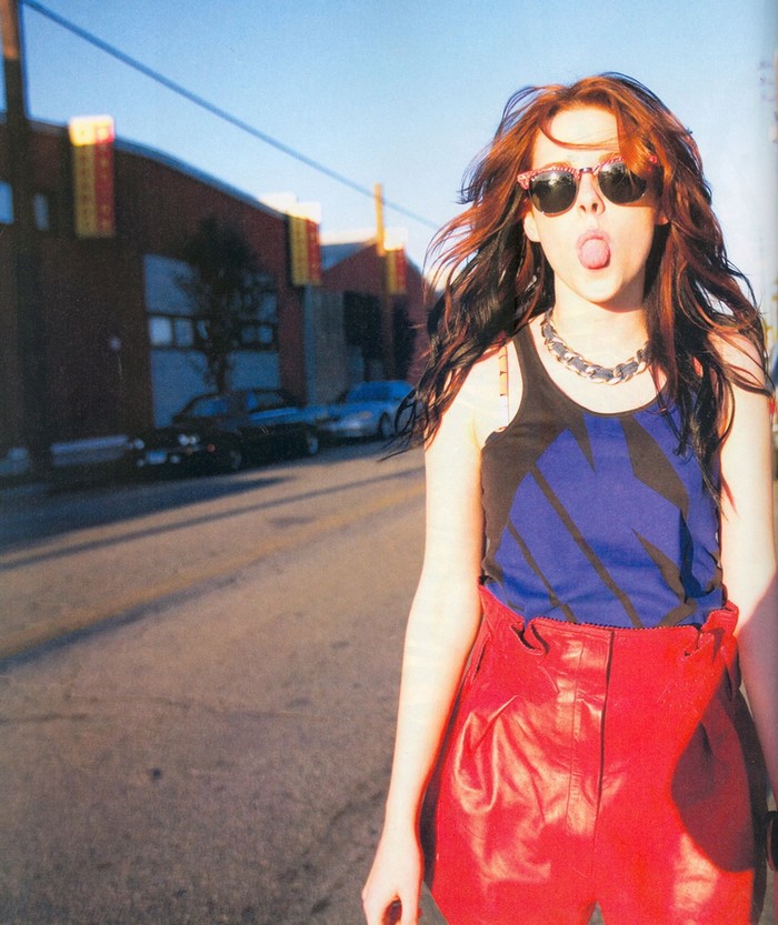 Kristen Stewart in red leather pants and sunglasses