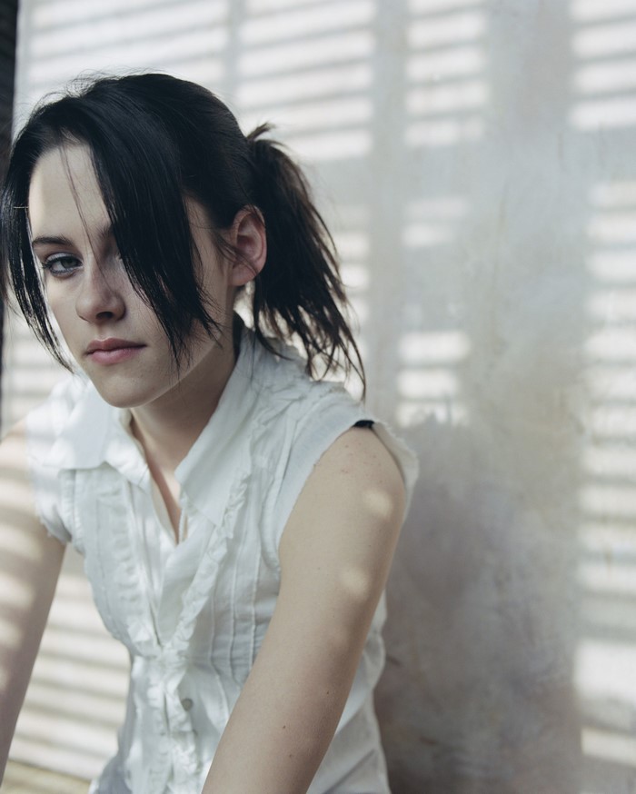 Kristen Stewart in a white ruffled shirt