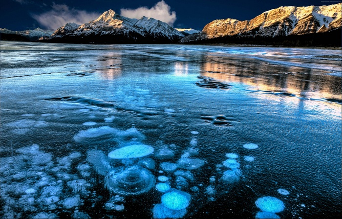 Abraham Lake Ice Bubbles and Mountains, Canada 4K