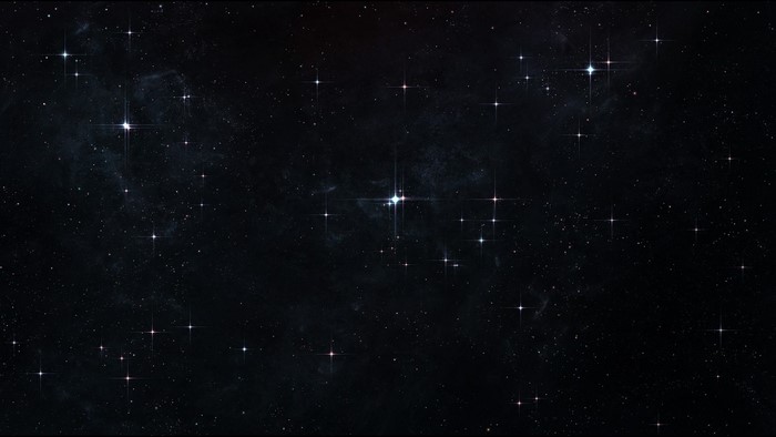 Starry night sky with nebula and distant stars