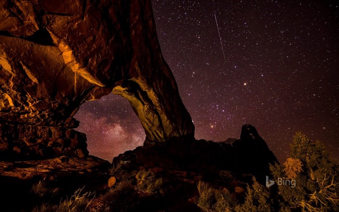 Night sky with stars and rock formation