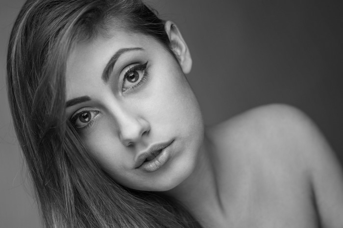 Monochrome portrait of a woman with brown hair