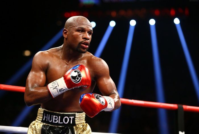 Floyd Mayweather boxing in a ring