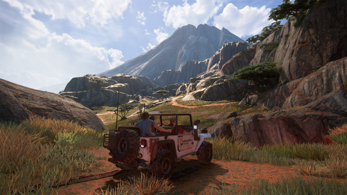 Nathan Drake and Sully in a Jeep in Uncharted 4