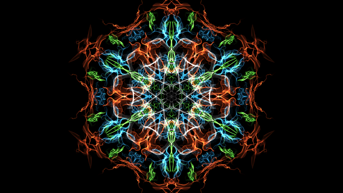 Symmetrical fractal art with orange, blue, and green lights