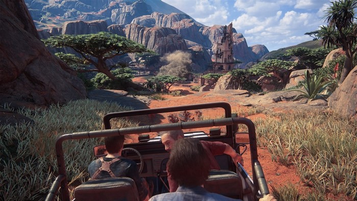 Nathan Drake and companions in a jeep in Uncharted 4 A Thief's End