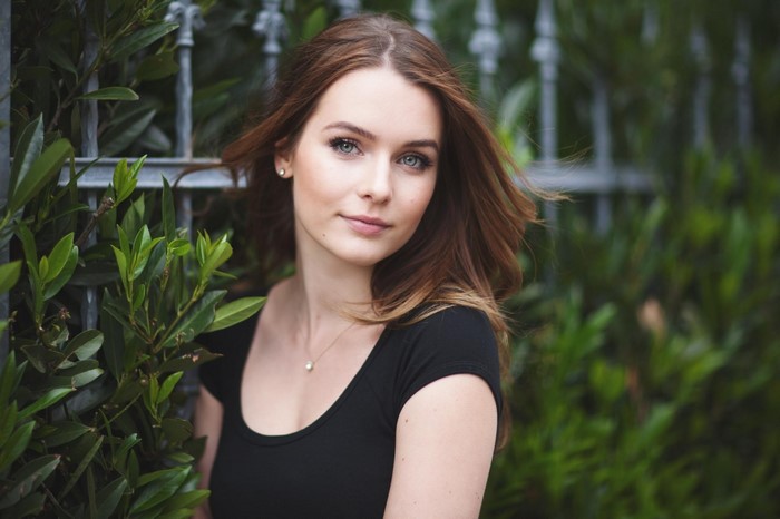 Portrait of a Woman with Flowing Brown Hair
