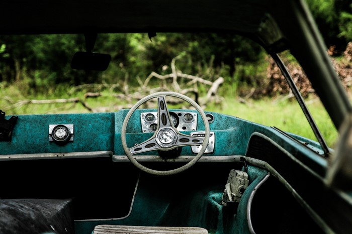 Vintage boat dashboard with steering wheel