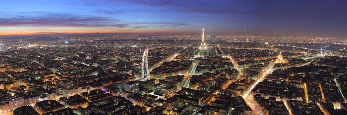 Paris cityscape at dusk with Eiffel Tower and Sacré-Cœur