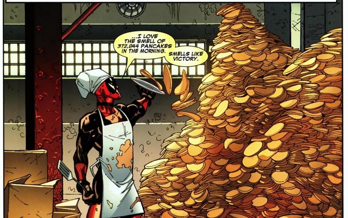Deadpool making a giant stack of pancakes