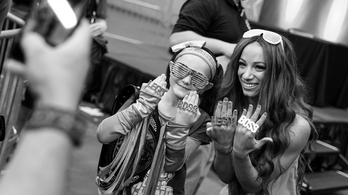 Sasha Banks with a young fan