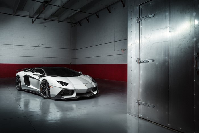 White Lamborghini Aventador in a garage